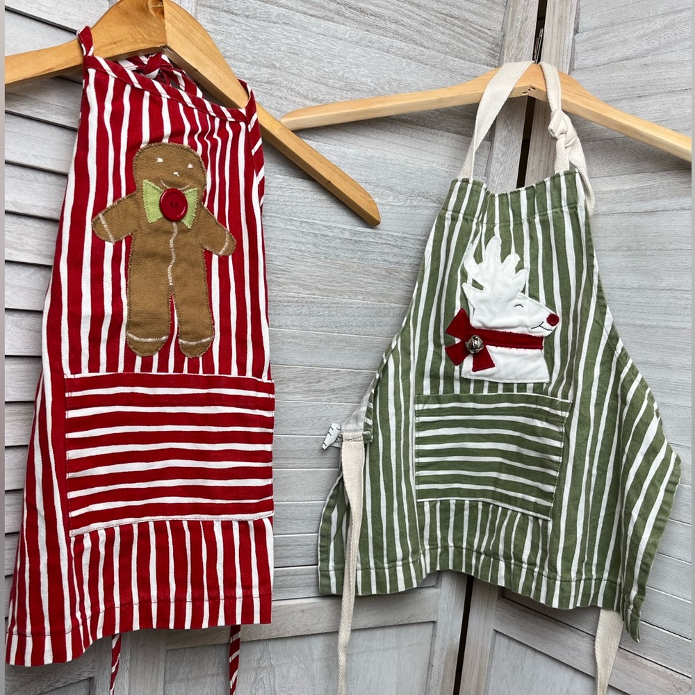 Children’s (up to sz8)Apron. Green/white/deer, red/white/gingerbread man.